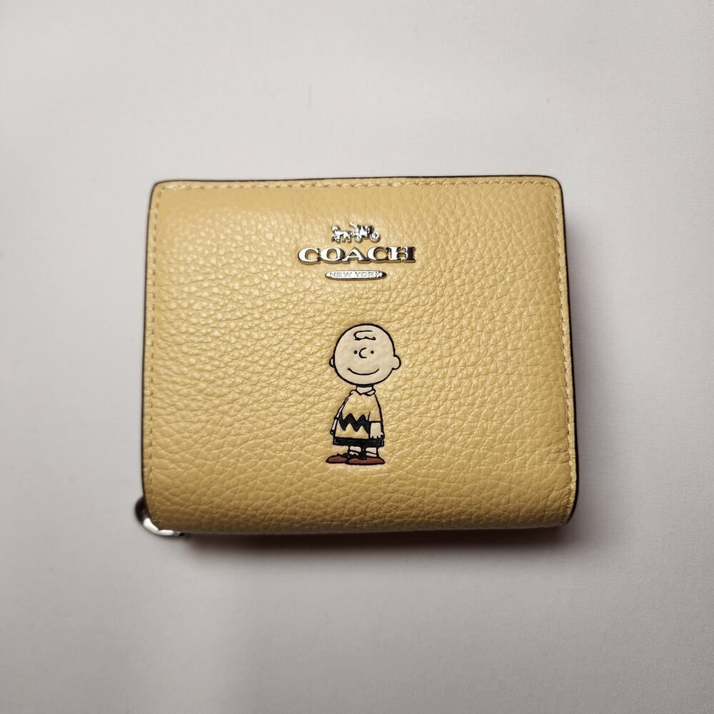 NWT Coach CBN90 X Peanuts Charlie Brown Snap Wallet Leather Hay Multi - Picture 1 of 8
